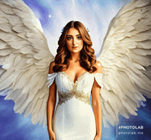 a woman in a white dress with angel wings has #photolab written on the bottom right