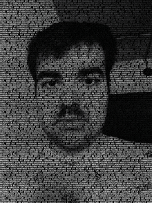 a poster of a man 's face made up of a lot of text .