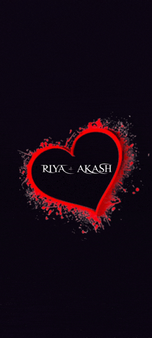 a red heart with the name riya akash written on it