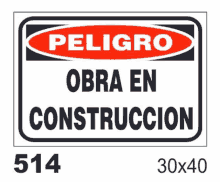 a sign that says " peligro obra en construccion " on it