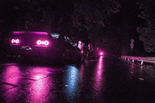 a car with purple lights on the back of it