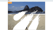 a computer screen shows a beach with a mountain in the background and the number -5999