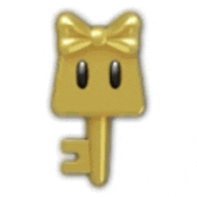 a gold key with a bow on it