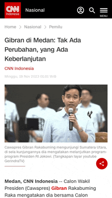 a screen shot of cnn indonesia shows a man holding a microphone