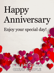 a happy anniversary greeting card with red and pink hearts