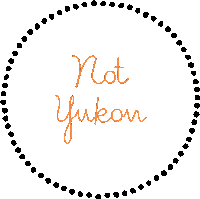 a circle with the words " not yukon " written inside of it