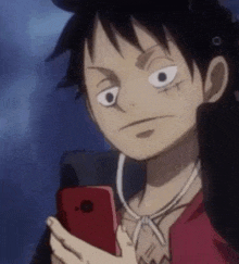 a cartoon character is holding a red cell phone and looking at it .