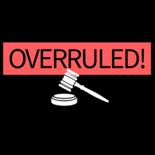 a sign that says overruled with a gavel