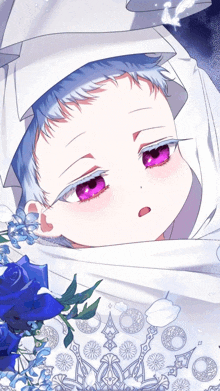 a baby with purple eyes is wrapped in a white blanket