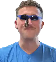 a man wearing blue sunglasses with a tag on his nose that says ' sunglasses ' on it