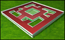 a red and green sign with a white border is sitting on top of a green field .