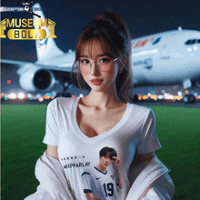 a woman wearing a white shirt with the number 19 on it stands in front of an airplane