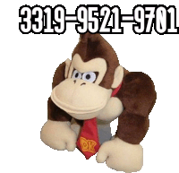 a stuffed donkey kong with the phone number 3319-9521-9701 on the bottom