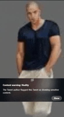 a blurry picture of a man with a content warning on the bottom