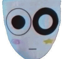 a white mask with two black circles and a star on it