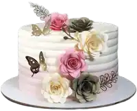 a pink and white cake with paper flowers and butterflies