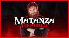 a man with a beard is standing in front of a matanza republic poster