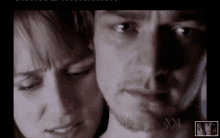 a close up of a man and woman 's faces with the letters a and n on the screen