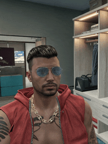 a man wearing sunglasses and a red vest has a tattoo on his chest