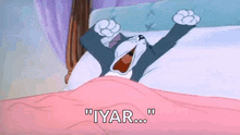 a cartoon cat is yawning while laying in bed with his mouth open .