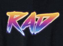 a neon sign that says rad on a dark background