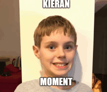 a picture of a young boy with the caption " kieran moment " on it