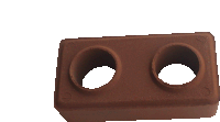 a brown brick with two holes in it