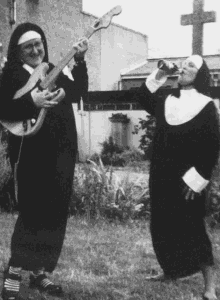 two nuns are drinking and playing guitars in a black and white photo