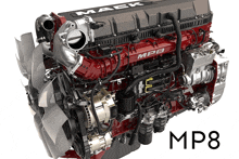 a red and black mack mp8 diesel engine