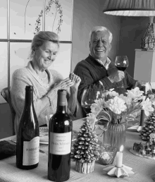 a bottle of pomerol sits next to a bottle of petite villane