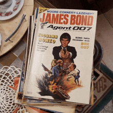 a stack of james bond agent 007 books