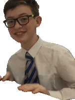 a young boy wearing glasses and a white shirt and tie