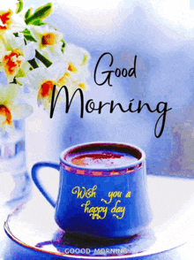 a cup of coffee with the words good morning wish you a happy day on it