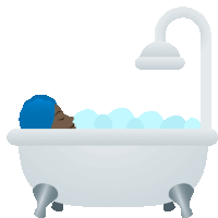 a person is taking a bath in a bathtub