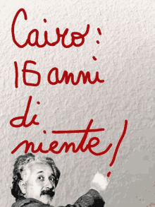 a picture of einstein with the words cairo 16 anni di niente written in red