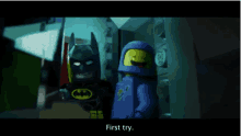 a lego batman and spaceman are standing next to each other