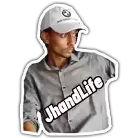 a man wearing a bmw hat has a sticker that says jhandlife on his shirt