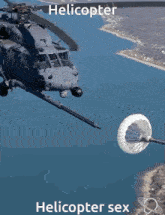 a helicopter is flying over a body of water