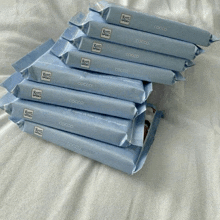 a stack of ritter sport cocoa bars on a white surface