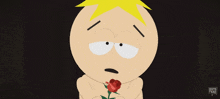 a cartoon character from south park is holding a rose