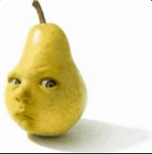 a pear with a face on it looks like a baby