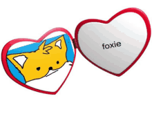 a heart shaped mirror with a picture of a fox and the word foxie