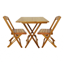 a wooden table with two folding chairs on a white background