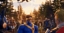 a group of cartoon characters including cyclops are standing in a field