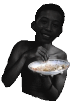 a shirtless man is holding a bowl of food and smiling at the camera