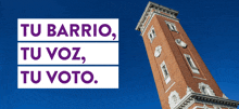 a brick tower with the words tu barrio tu voz tu voto on it