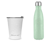 a white tumbler that says oburan me next to a green bottle