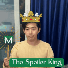 a man with a crown on his head is holding a sword with the words the spoiler king below it