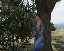 a woman leaning against a tree holding a sword