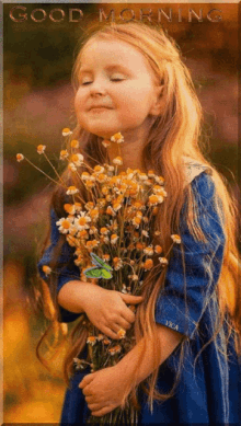 a little girl in a blue dress is holding a bouquet of flowers with the words good morning above her